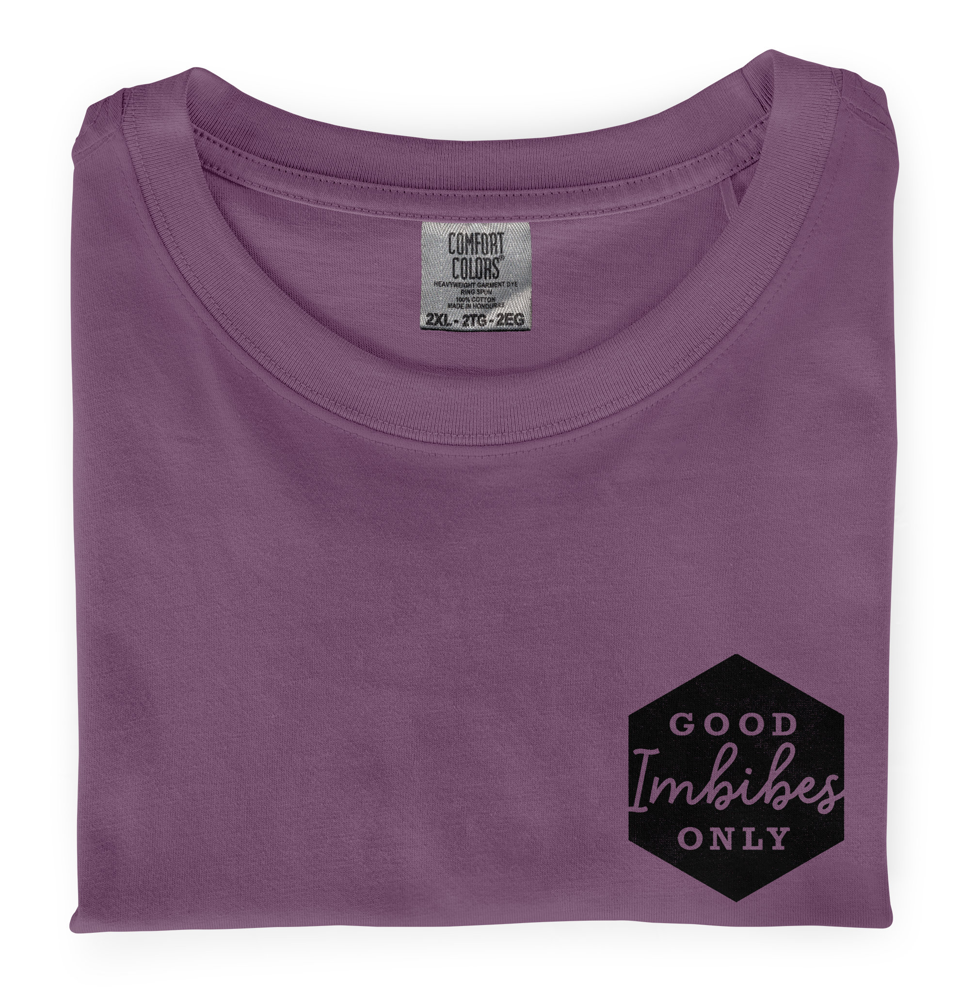 A close-up picture of a folded Berry colored Comfort Colors T-shirt with a screen printed graphic heart print on the front.