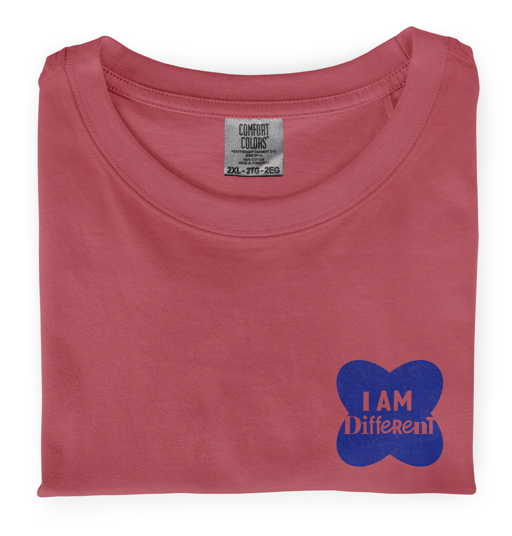 Close-up photo of a folded watermelon colored t-shirt with a graphic printed on the front chest that says I Am Different.