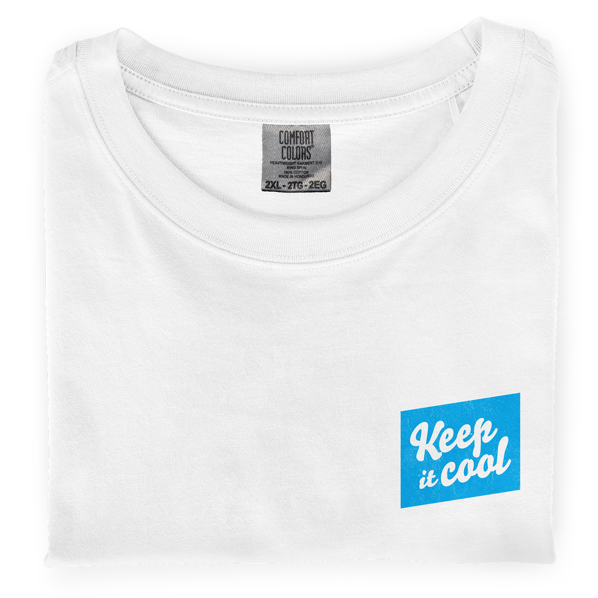 A close-up photo of a folded, white colored dyed-ink comfort colors t-shirt with a front chest screen printed graphic that says Keep It Cool 