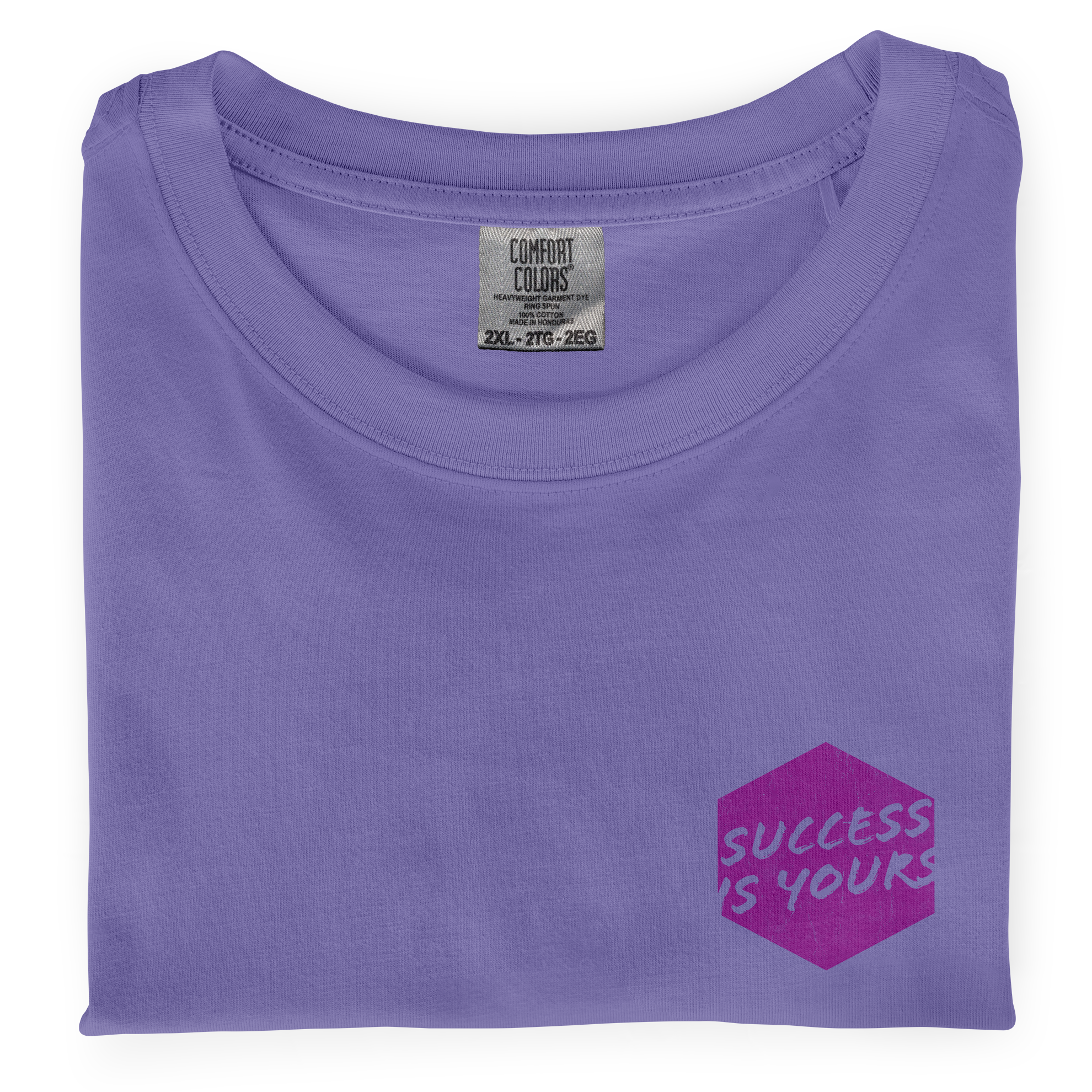 Close-up photo of a folded violet colored t-shirt with a graphic printed on the front chest that says Success is Yours.