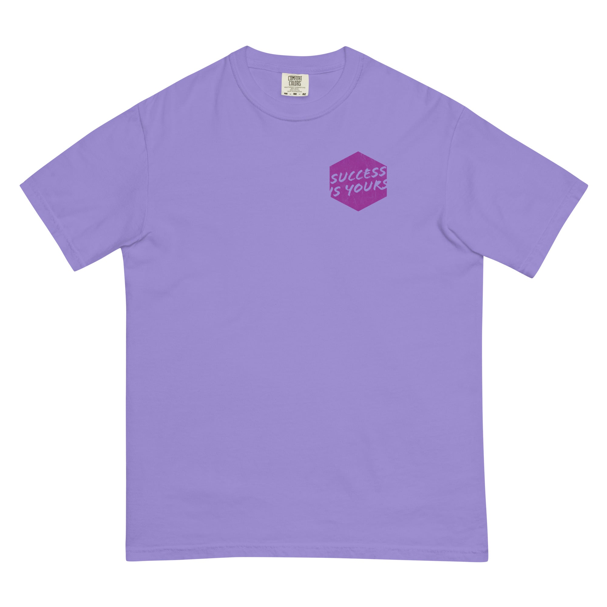 Photo of a violet colored t-shirt with a graphic printed on the front chest that says Success is Yours.