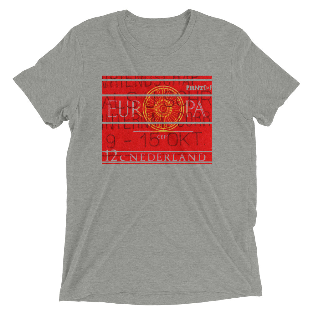 A photo of a gray t-shirt with a vintage Dutch stamp on the front.