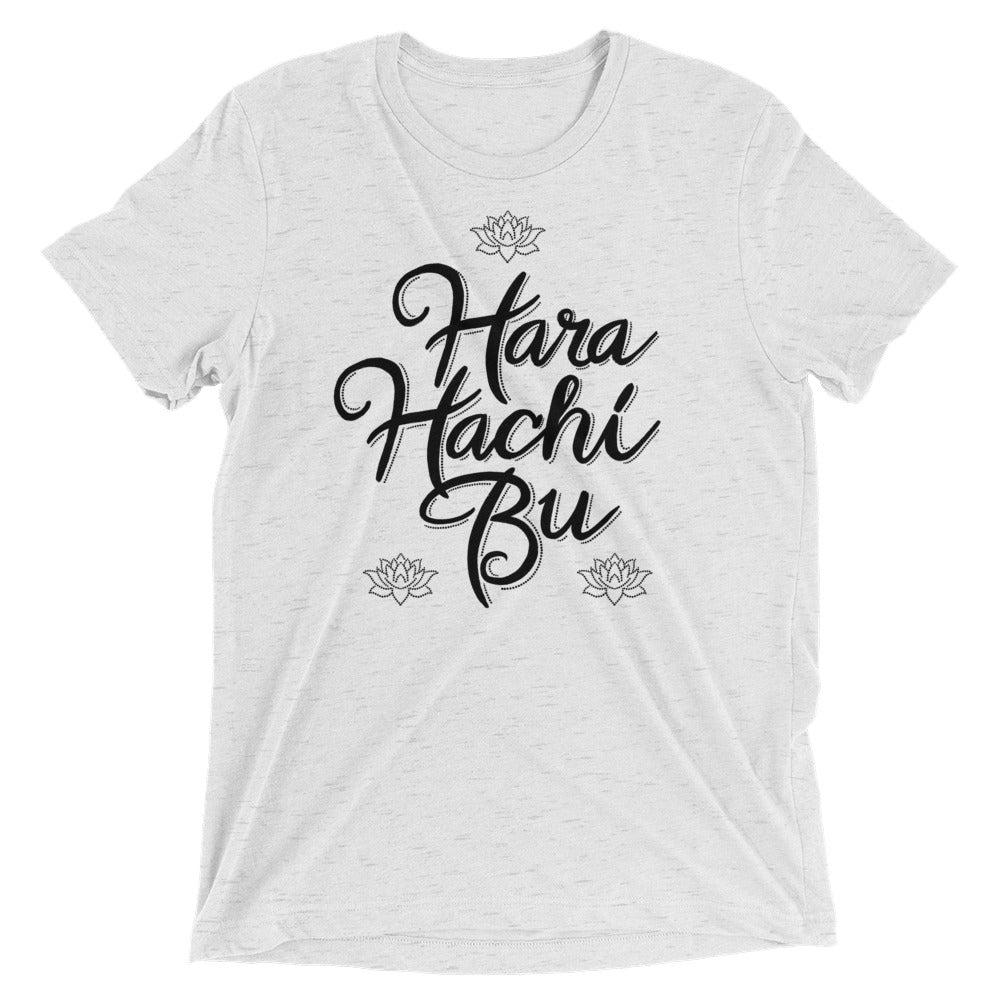 A white t-shirt that says Hara Hachi Bu in a custom brush typeface.