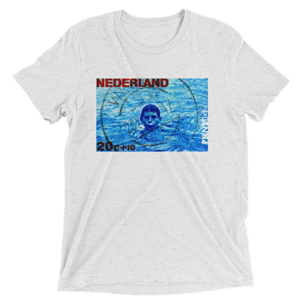 A photo of a wrinkled white fleck t-shirt with a vintage Dutch stamp printed on the front.